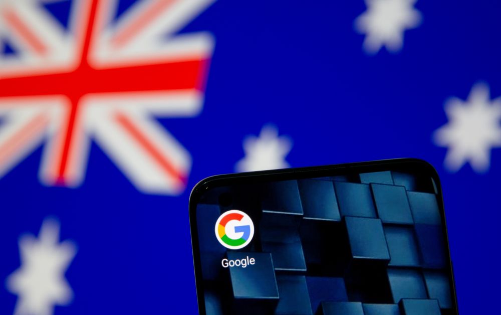 A smartphone with a Google app icon is seen in front of the displayed Australian flag in this illustration, January 22, 2021. u00e2u20acu201d Reuters pic