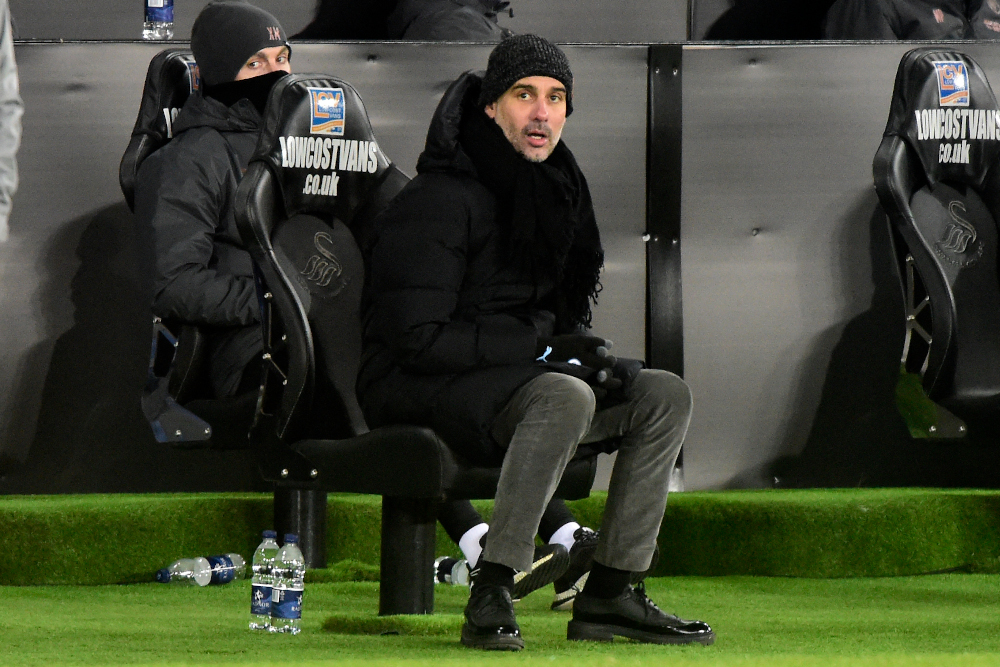 Manchester City manager Pep Guardiola looks on during the English FA Cup fifth round football match between Swansea and Manchester City at the Liberty Stadium in Swansea, Wales February 10, 2021. u00e2u20acu201d AFP pic 