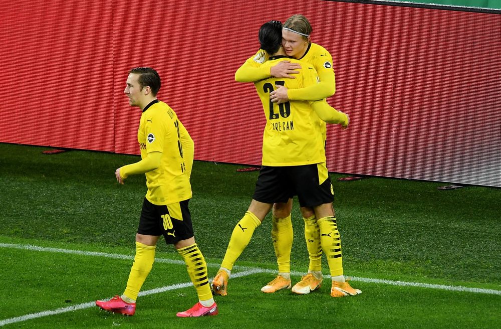 Borussia Dortmund's Erling Braut Haaland celebrates scoring their third goal against Paderborn with Emre Can at the Signal Iduna Park, Dortmund February 2, 2021. u00e2u20acu201d Reuters pic