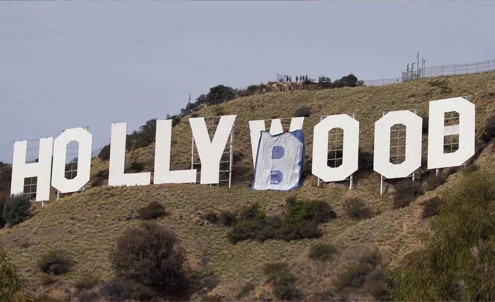 The two social media personalities were arrested on Monday for altering the iconic Los Angeles landmark. u00e2u20acu201d Picture from Instagram/@savage