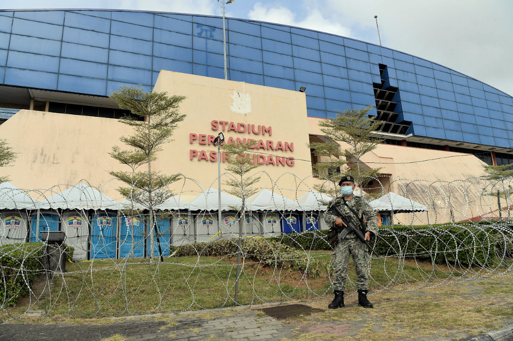 Army personnel patrol the Covid-19 Low-Risk Quarantine and Treatment Centre in Johor Baru, February 10, 2021. u00e2u20acu201d Bernama pic 