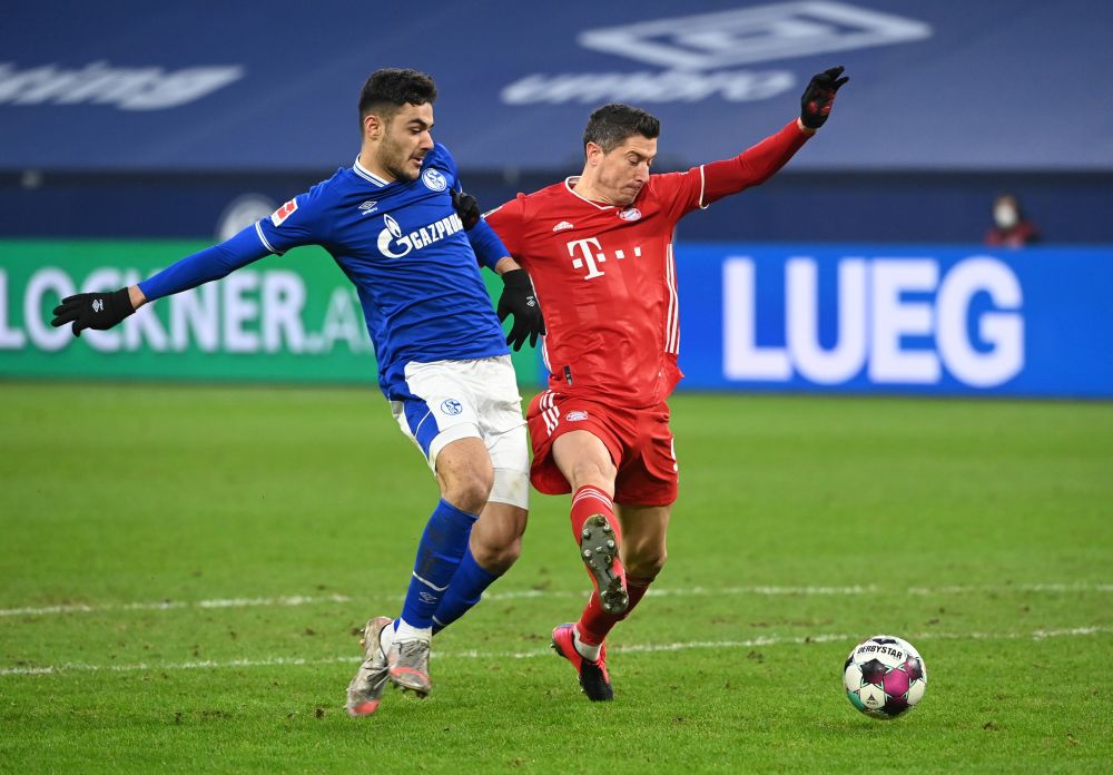 Bayern Munich's Robert Lewandowski in action with Schalke 04's Ozan Kabak (left) at the Veltins-Arena, Gelsenkirchen January 24, 2021. u00e2u20acu201d Reuters pic