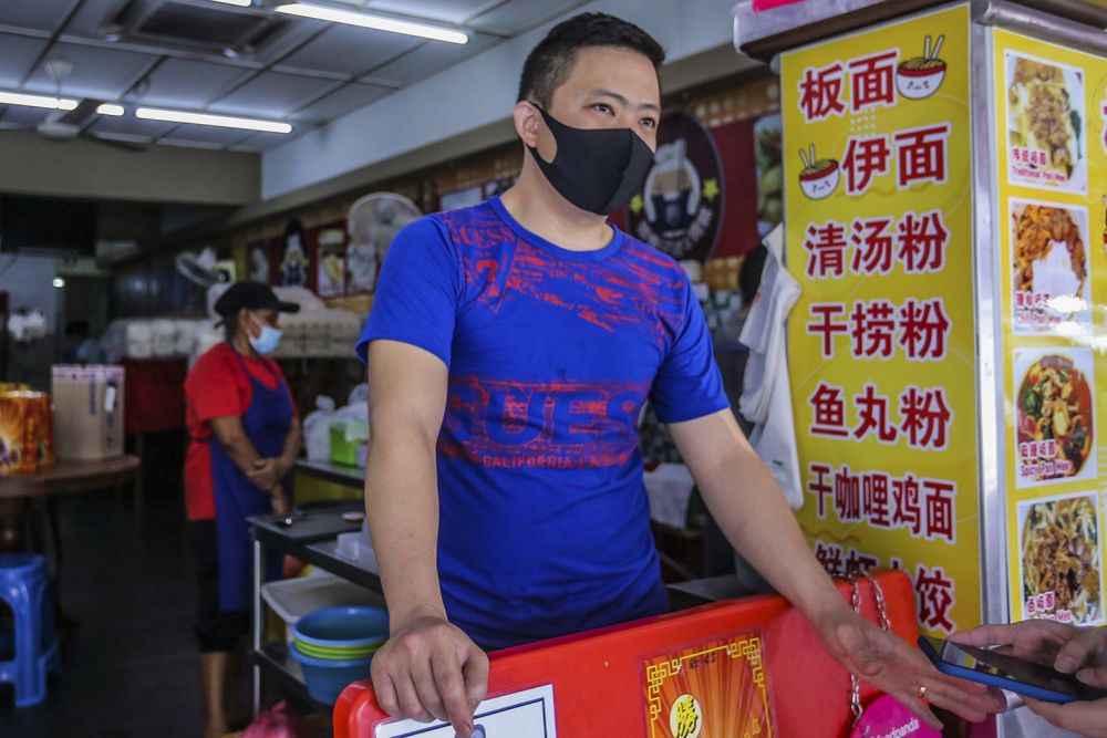 Little Sifu Famous Roast Meat proprietor Tevez speaks to Malay Mail during an interview at Pandan Indah February 10, 2021. — Picture by Hari Anggara