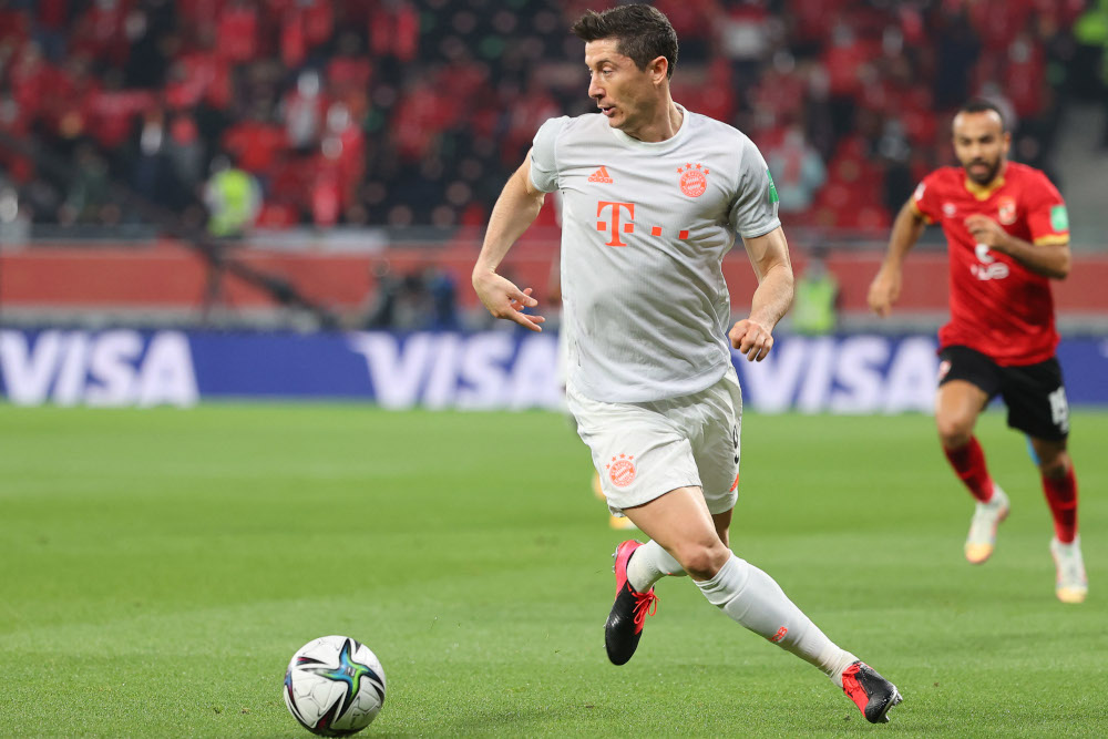 Bayern Munichu00e2u20acu2122s Polish forward Robert Lewandowski controls the ball during the Fifa Club World Cup semi-final football match between Egyptu00e2u20acu2122s Al-Ahly and Germanyu00e2u20acu2122s Bayern Munich at the Ahmed bin Ali Stadium in the Qatari city of Ar-Rayyan February 8,