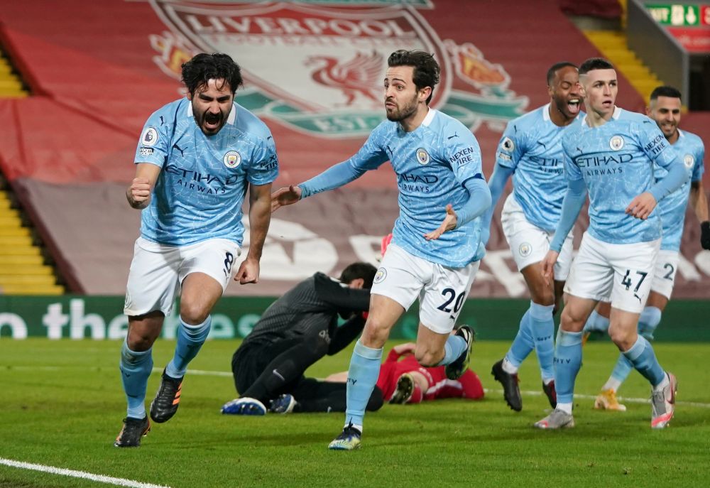 Manchester City's Ilkay Gundogan celebrates scoring their first goal against Liverpool at Anfield, Liverpool February 7, 2021. u00e2u20acu201d Reuters picn