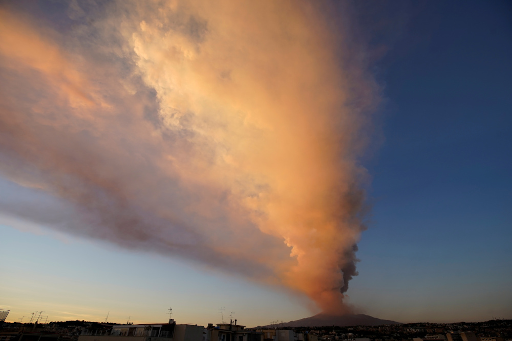 Mount Etna, Europeu00e2u20acu2122s most active volcano, spews volcanic ash as it leaps into action, seen from the village of Catania, Italy February 16, 2021. u00e2u20acu201d Reuters pic 