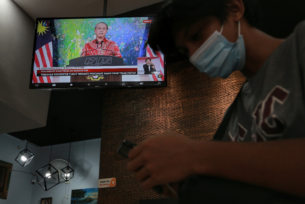 Prime Minister Tan Sri Muhyiddin Yassin live on television for a Covid 19 special announcement February 4, 2021. u00e2u20acu201d Picture by Ahmad Zamzahuri