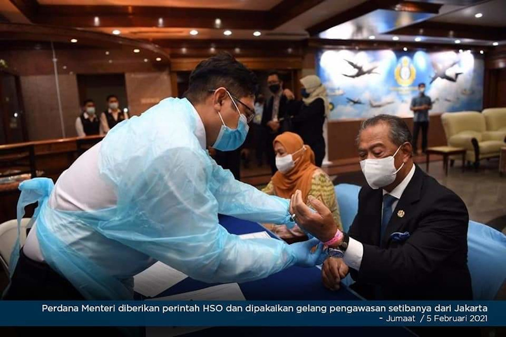 PMO said Prime Minister Tan Sri Muhyiddin Yassin was issued a home surveillance order and a quarantine wrist tag upon his return on February 5. u00e2u20acu201d Picture courtesy of Prime Ministeru00e2u20acu2122s Office
