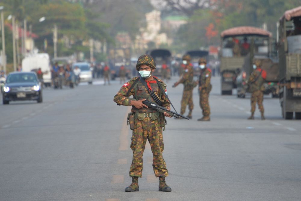 A Myanmar soldier stands guard on a road amid demonstrations against the military coup in Naypyidaw February 17, 2021. u00e2u20acu201d AFP pic 