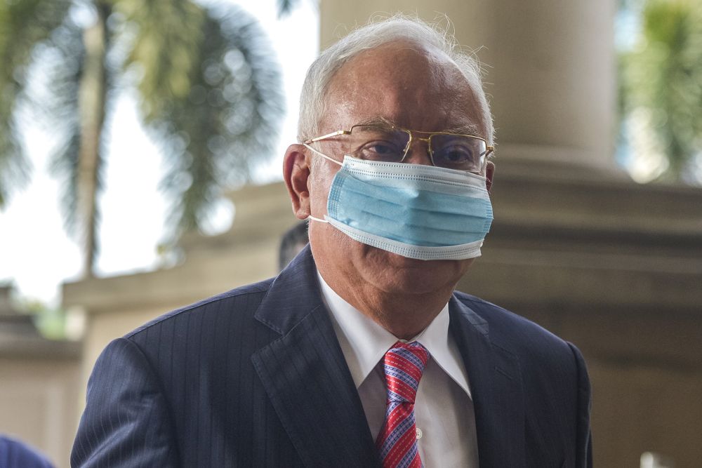 Datuk Seri Najib Razak arrives at the Kuala Lumpur High Court on February 11, 2021. u00e2u20acu201d Picture by Miera Zulyana