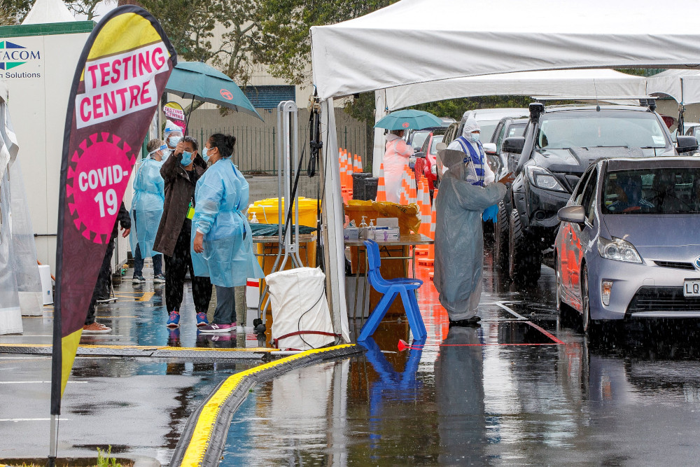 Motorists queue at the Otara testing station after a positive Covid-19 case was reported in the community as the city enters a level 3 lockdown in Auckland February 15, 2021. u00e2u20acu201d AFP pic 