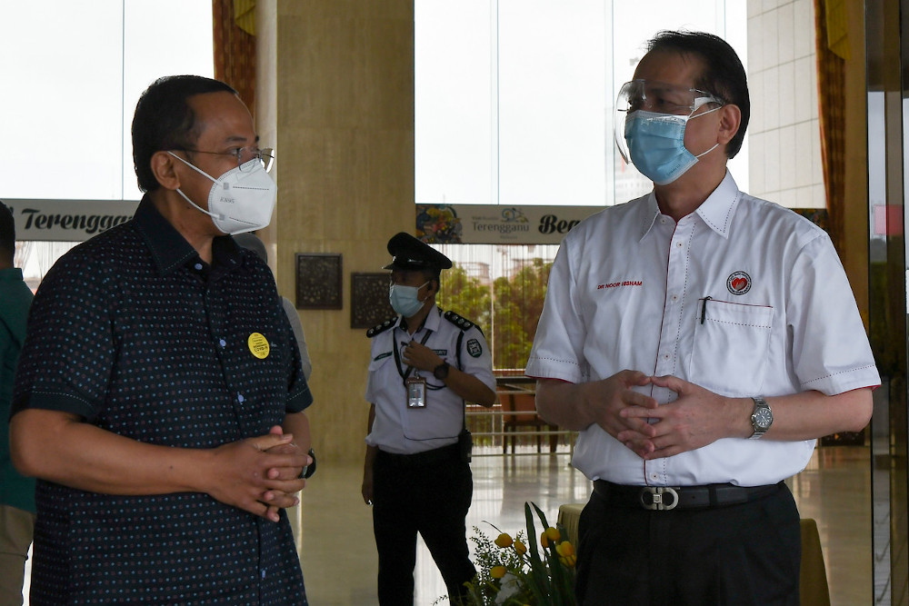 Health Director-General Tan Sri Dr Noor Hisham Abdullah with Terengganu Mentri Besar Datuk Seri Ahmad Samsuri Mokhtar during a working visit to Terengganu at Wisma Darul Iman February 1, 2021. u00e2u20acu201d Bernama picn