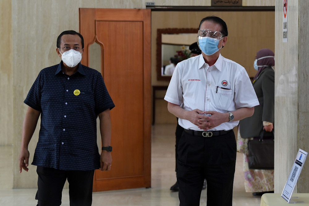 Health Director-General Tan Sri Dr Noor Hisham Abdullah with Terengganu Mentri Besar Datuk Seri Ahmad Samsuri Mokhtar during a working visit to Terengganu at Wisma Darul Iman February 1, 2021. u00e2u20acu201d Bernama pic 