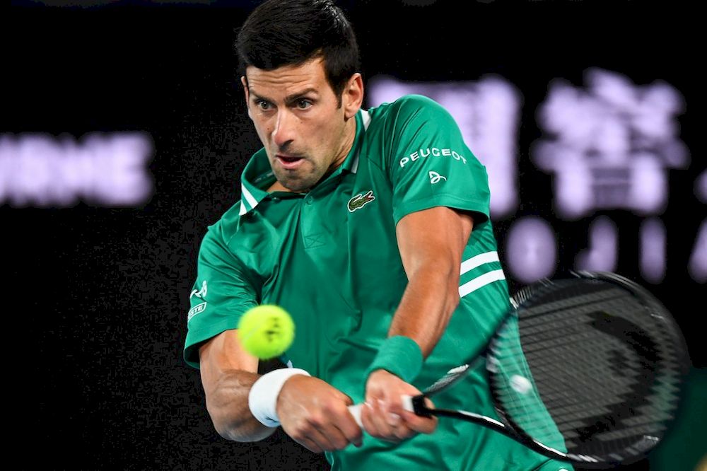 Serbiau00e2u20acu2122s Novak Djokovic hits a return against Franceu00e2u20acu2122s Jeremy Chardy during day one of the Australian Open tournament in Melbourne, February 8, 2021. u00e2u20acu201d AFP pic