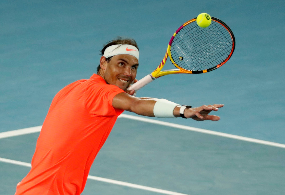 Spainu00e2u20acu2122s Rafael Nadal celebrates after winning his second round match against Michael Mmoh of the US at Melbourne Park, February 11, 2021. u00e2u20acu201d Reuters picnn