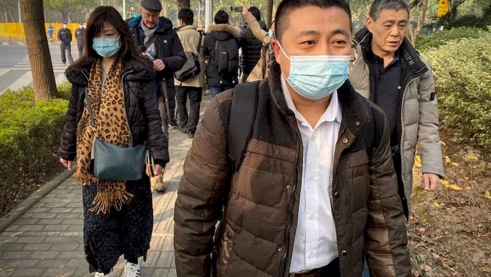 Chinese lawyer Ren Quanniu, who represented a Hong Kong activists charged with fleeing Hong Kong had his license revoked. u00e2u20acu201d AFP pic