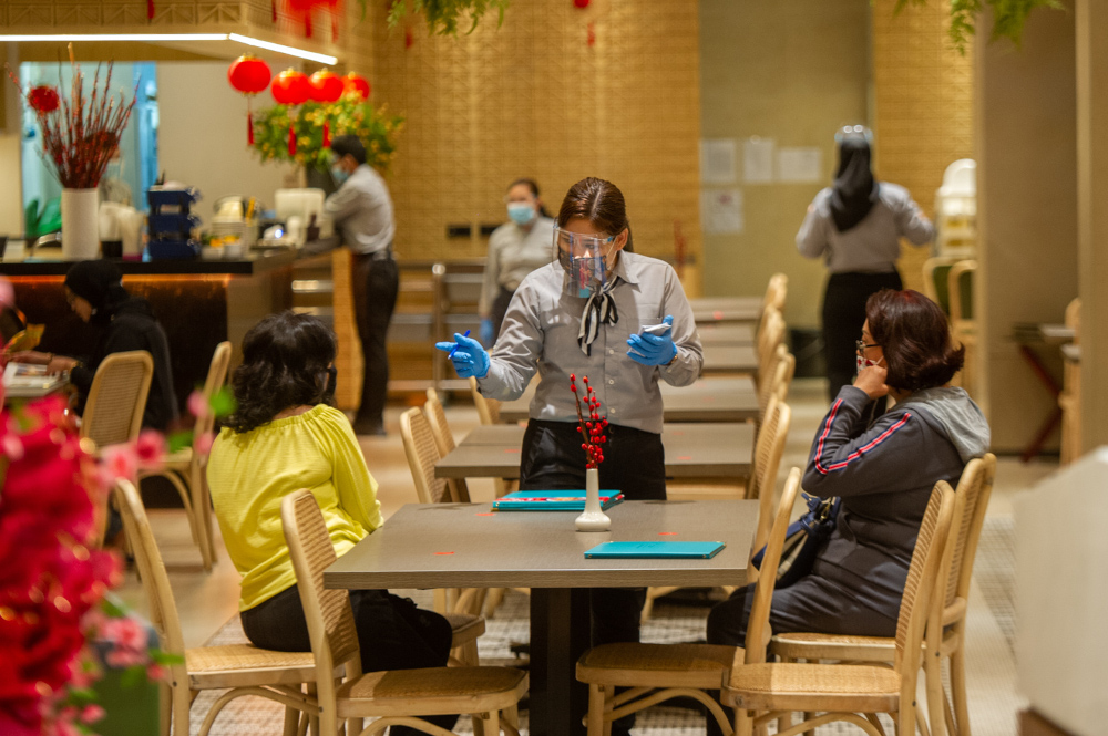 Patrons are seen here having their meals at a mall in Kuala Lumpur during lunch hour. u00e2u20acu201d Picture by Shafwan Zaidon