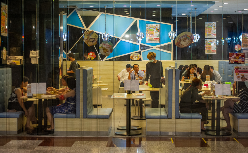 Patrons are seen here having their meals at a mall in Kuala Lumpur during lunch hour. u00e2u20acu201d Picture by Shafwan Zaidon