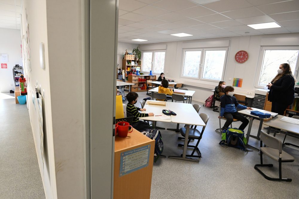 Schoolchildren participate in a lesson at Gustav-Falke elementary school, after it reopened according to first measures to lift the Covid-19 lockdown in Berlin February 22, 2021. u00e2u20acu201d Reuters pic