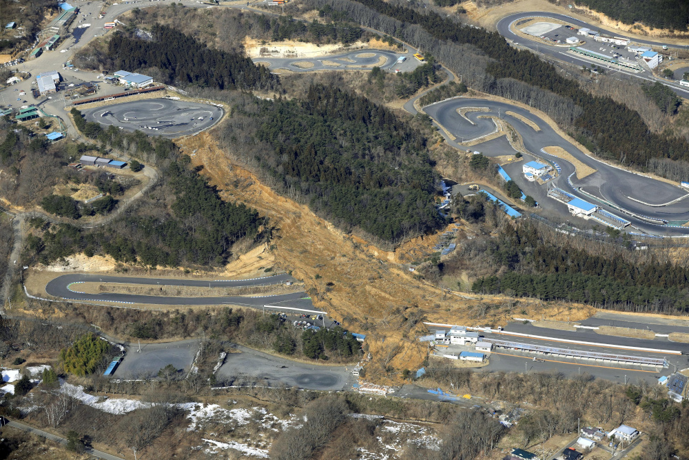 An aerial view shows a landslide caused by a strong earthquake is seen on a circuit course in Nihonmatsu, Fukushima Prefecture, Japan on February 14, 2021 in this photo taken by Kyodo. u00e2u20acu201d Picture by Kyodo via Reuters 