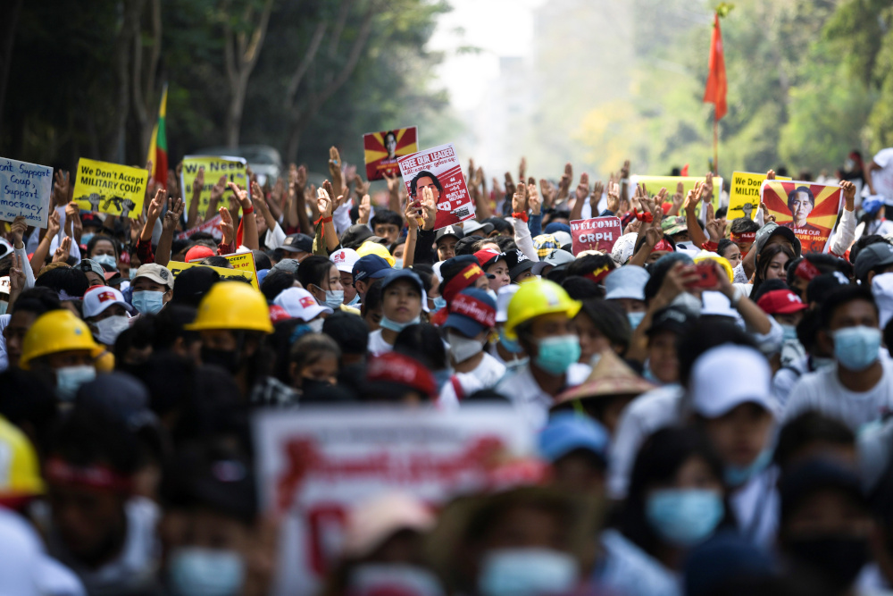 Demonstrators flash the three-finger salute as they take part in a protest against the military coup in Yangon February 22, 2021. u00e2u20acu201d Reuters pic