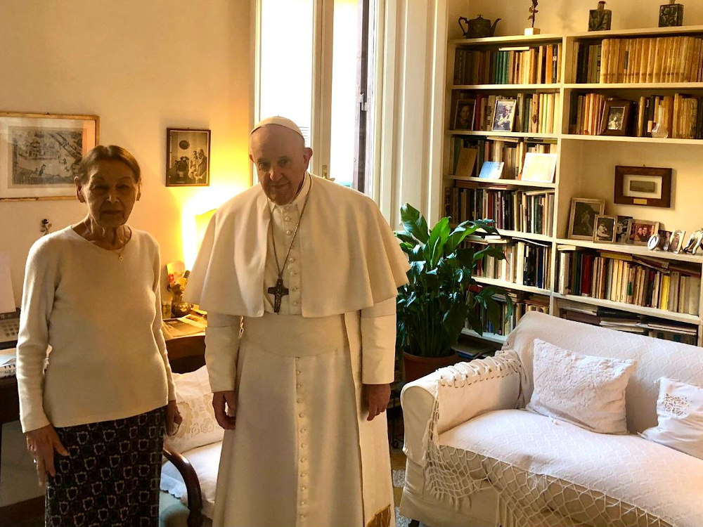 Pope Francis and poetess and Holocaust survivor, Edith Brick, pose for photographs in Rome February 20, 2021. u00e2u20acu201d Picture by Vatican Media/Handout via Reuters