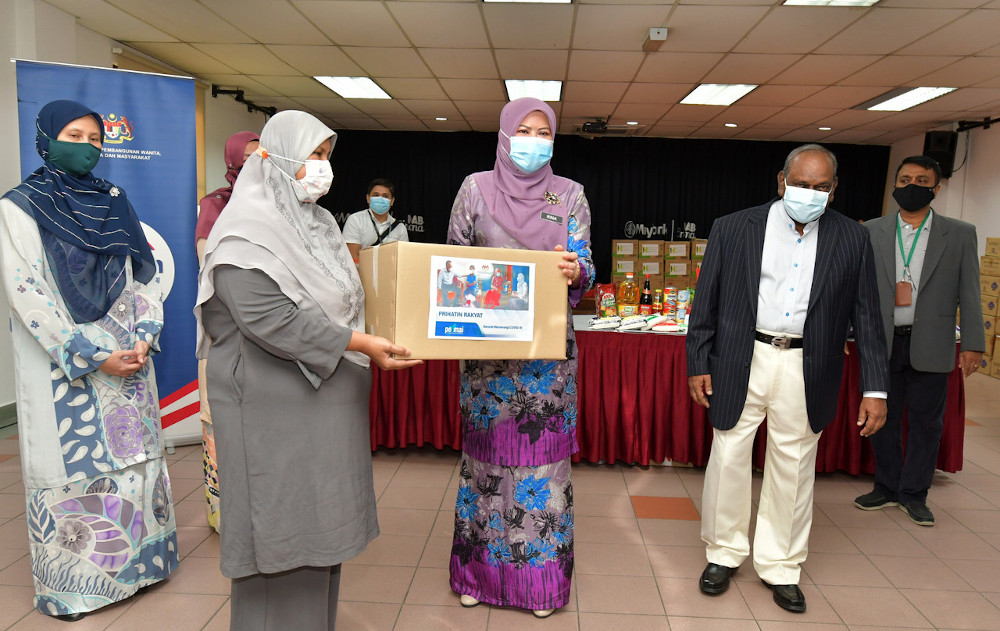 Datuk Seri Rina Mohd Harun handing out food aid baskets to members of the Malaysian Association for the Blind in Bangsar, February 11, 2021. u00e2u20acu201d Bernama pic 