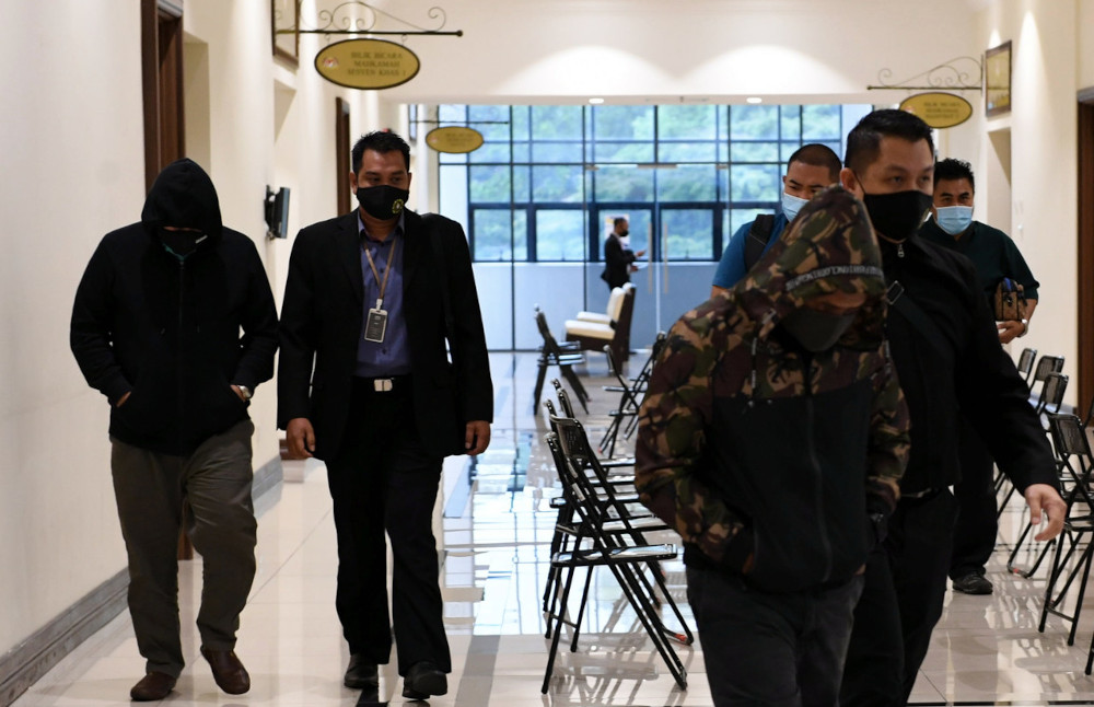 Panduan Paglin, 40, and Erwan Roslan, 41, who are staff of the Sabah National Anti-Drug Agency (AADK), were charged under Section 18 of the Malaysian Anti-Corruption Commission (MACC) Act 2009 for making false travel and hotel claims. u00e2u20acu201d Bernama pic