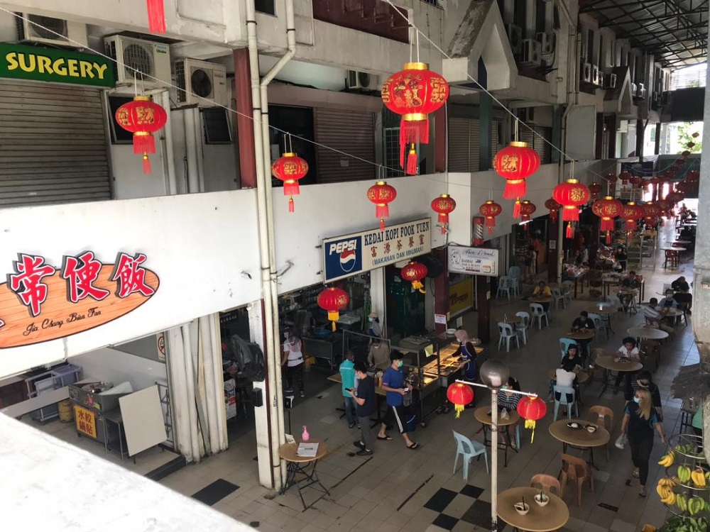 Restaurants and eateries in suburbs like Damai, Lintas and Lido are grateful to be allowed to open in the last days leading up to Chinese New Year but say that customers are slow to return. u00e2u20acu2022 Picture by Julia Chan