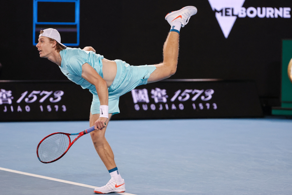 Canadau00e2u20acu2122s Denis Shapovalov serves against Italyu00e2u20acu2122s Jannik Sinner during their menu00e2u20acu2122s singles match on day one of the Australian Open tennis tournament in Melbourne on February 8, 2021. u00e2u20acu201d AFP pic 