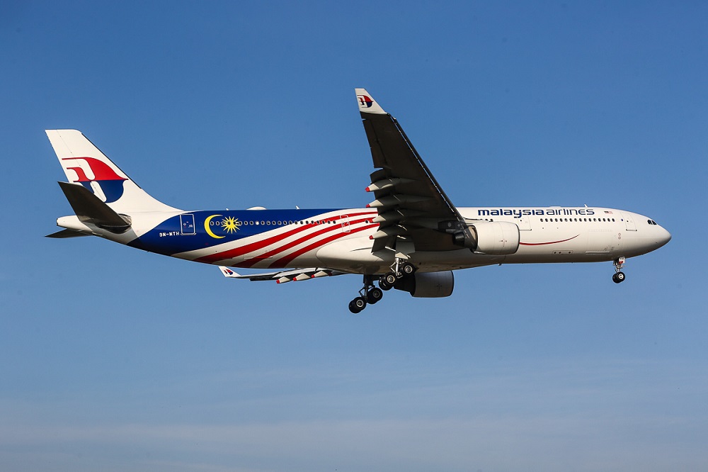 Malaysia Airlines flight MH319 carrying a shipment of the Sinovac vaccine approaches the Kuala Lumpur International Airport (KLIA) in Sepang February 27, 2021. u00e2u20acu2022 Picture by Yusof Mat Isa