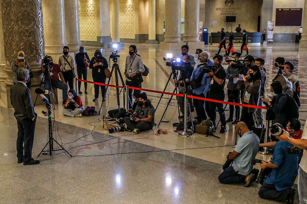 Malaysiakini editor-in-chief Steven Gan speaks to reporter at the Federal Court in Putrajaya February 19, 2021. u00e2u20acu2022 Picture by Hari Anggara