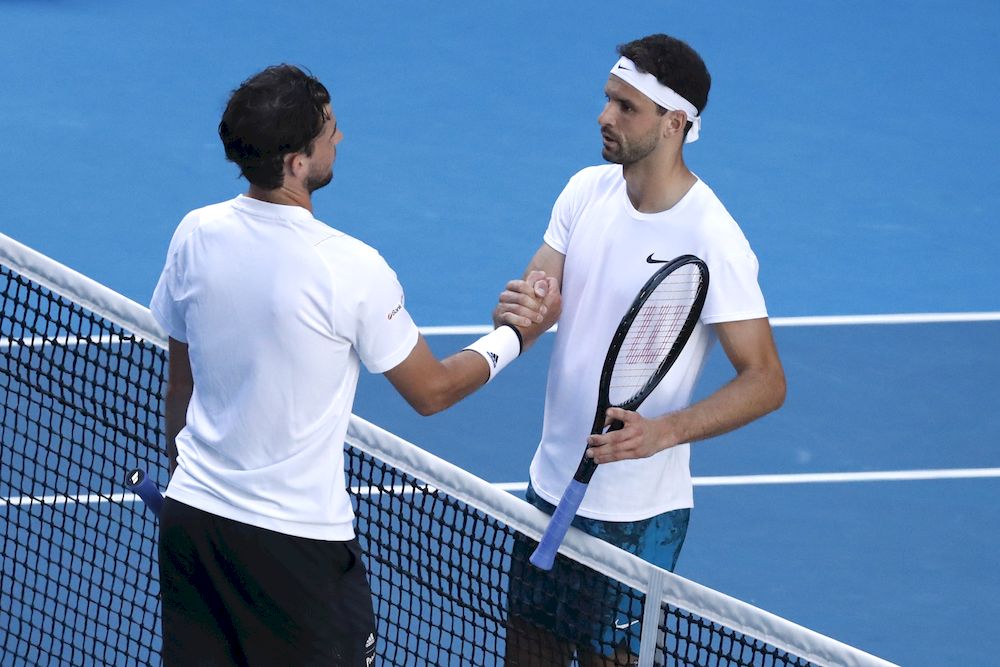 Bulgariau00e2u20acu2122s Grigor Dimitrov and Austriau00e2u20acu2122s Dominic Thiem after their fourth round match at the Australian Open in Melbourne, February 14, 2021. u00e2u20acu201d Reuters pic