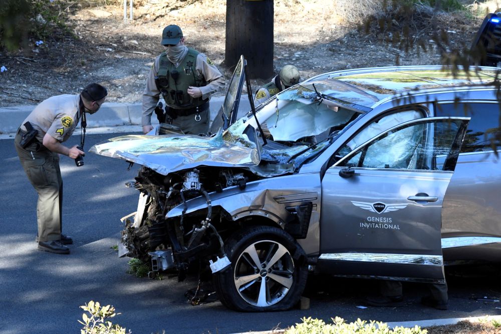 Los Angeles County Sheriff's Deputies inspect the vehicle of golfer Tiger after it was involved in a single-vehicle accident in Los Angeles, California February 23, 2021. u00e2u20acu201d Reuters pic 