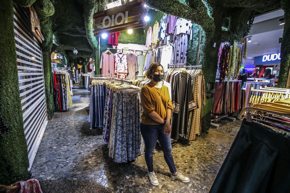 Shopkeeper Najiha Idris speaks during an interview with Malay Mail at Berjaya Times Square, Kuala Lumpur February 23, 2021. ― Picture by Hari Anggara