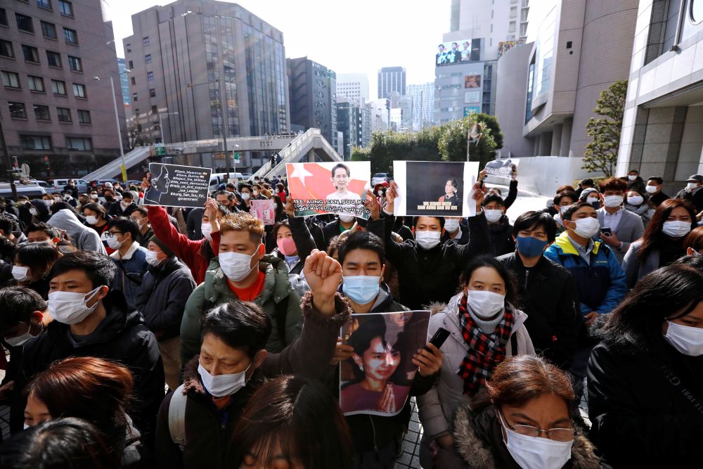 Myanmar protesters residing in Japan hold signs and photos of Aung San Suu Kyi as they rally against Myanmar's military in Tokyo February 1, 2021. u00e2u20acu201d Reuters pic
