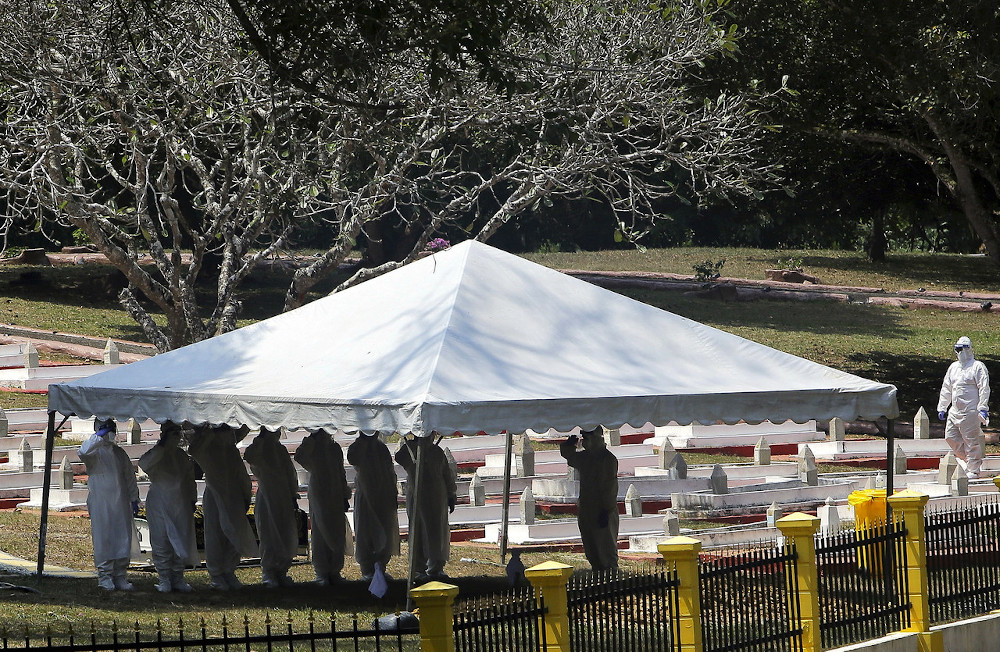 WWII veteran Private Ujang Mormin was laid to rest at the RAMD cemetery in Port Dickson at 2.20pm, February 10, 2021. u00e2u20acu201d Bernama pic 