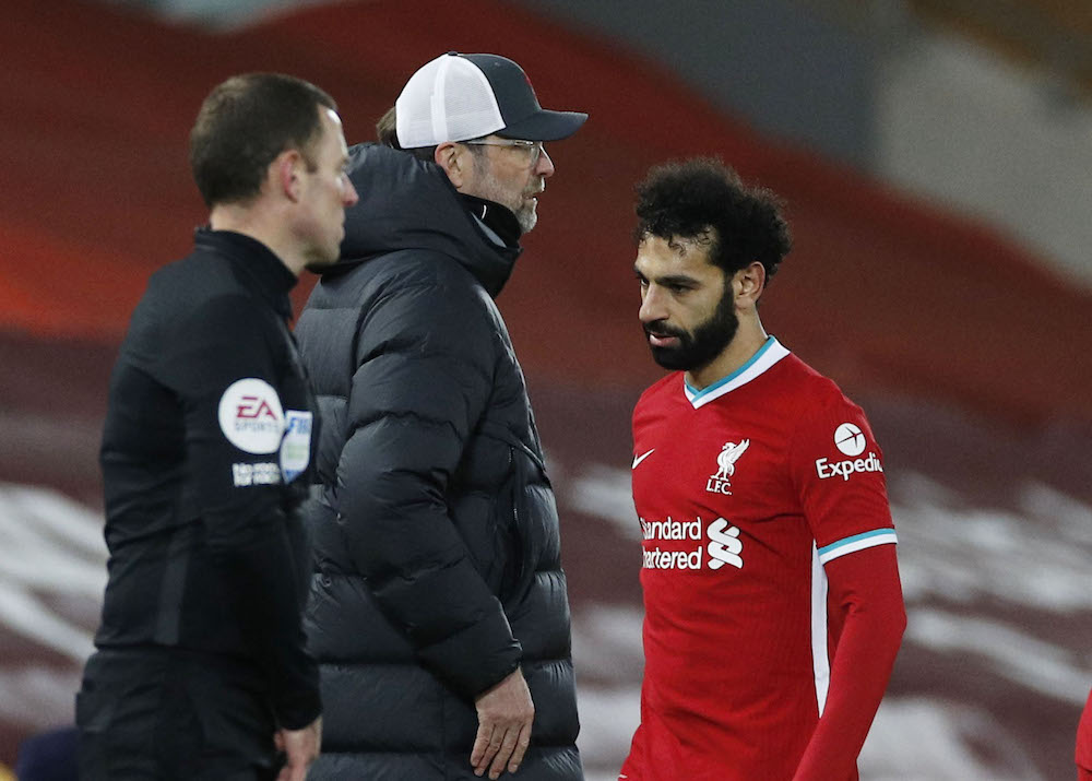 Liverpool's Mohamed Salah walks past manager Juergen Klopp after being substituted off, March 5, 2021. u00e2u20acu201d Pool via Reuters/Phil Noble 