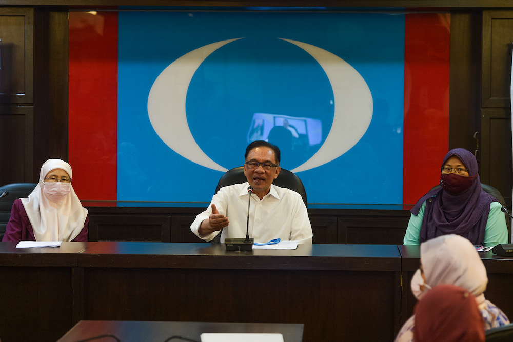 PKR President Datuk Seri Anwar Ibrahim speaks to the press in conjunction with International Womenu00e2u20acu2122s Day at the PKR headquarters in Petaling Jaya March 8, 2021. Picture u00e2u20acu201d by Miera Zulyana