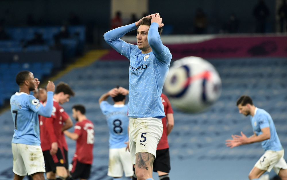 Manchester City's John Stones reacts after the match against Manchester United, March 8, 2021. u00e2u20acu201d Pool via Reuters/Peter Powell 