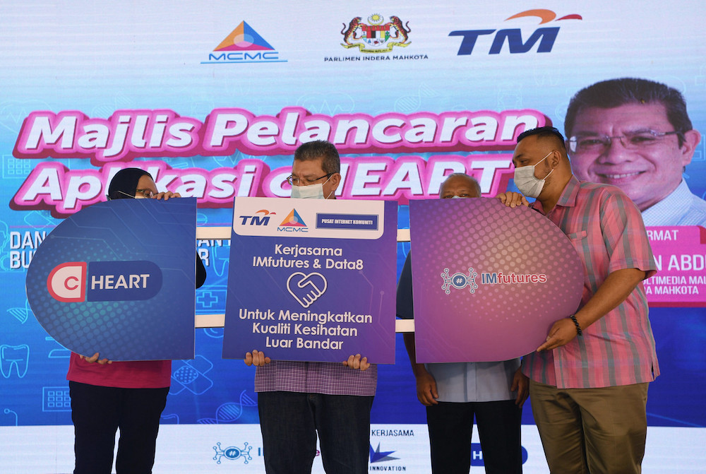 Communications and Multimedia Minister Datuk Saifuddin Abdullah launches the cHEART app at the Kampung Cherating community internet centre, March 14, 2021. u00e2u20acu201d Bernama pic
