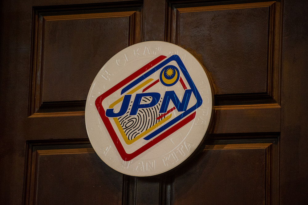 The logo of the National Registration Department at the National Registration Department in Putrajaya, March 18, 2021. u00e2u20acu201d Picture by Shafwan Zaidon