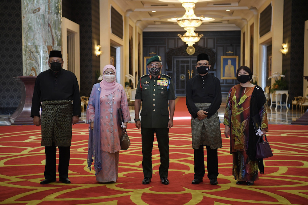 Yang di-Pertuan Agong Al-Sultan Abdullah Ri'ayatuddin Al-Mustafa Billah Shah with the four newly appointed Court of Appeal judges. u00e2u20acu201d Bernama pic