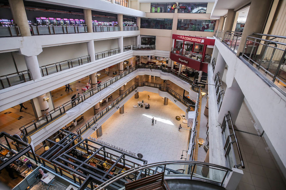 Though few patrons could be seen milling about in 1Utama Shopping Centre, shopkeepers say crowds tend to increase during the weekends March 4, 2021. u00e2u20acu2022 Picture by Hari Anggara