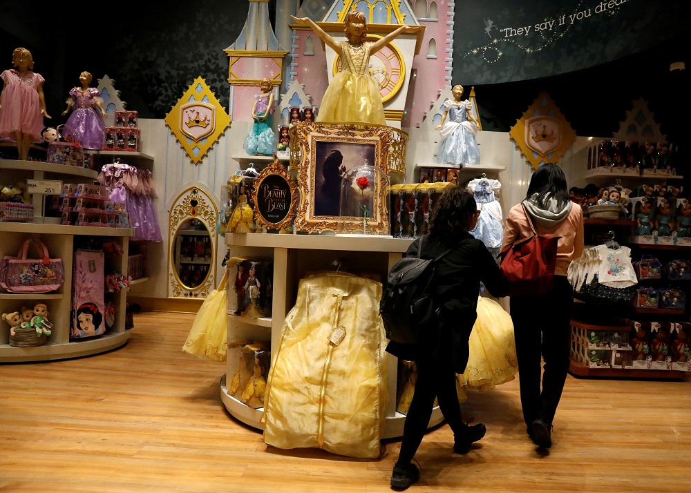 Customers look at u00e2u20acu02dcBeauty and the Beastu00e2u20acu2122 merchandise in a Disney Store in New York  May 9, 2017. u00e2u20acu201d Reuters pic