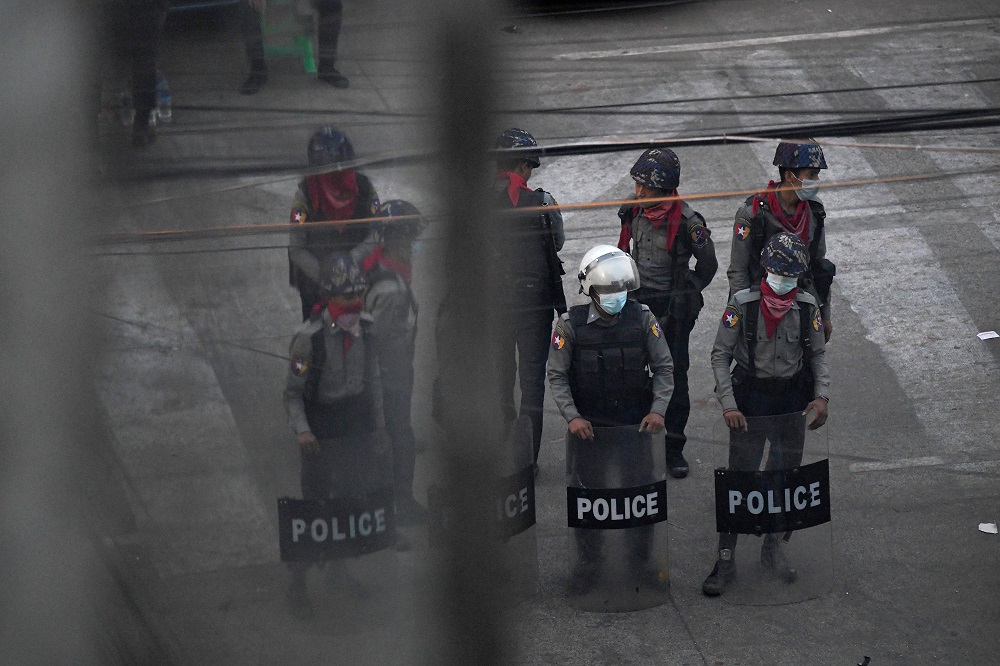 Police stand after they seized Sanchaung district in search of anti-coup demonstrators in Yangon March 8, 2021. u00e2u20acu201d Reuters
