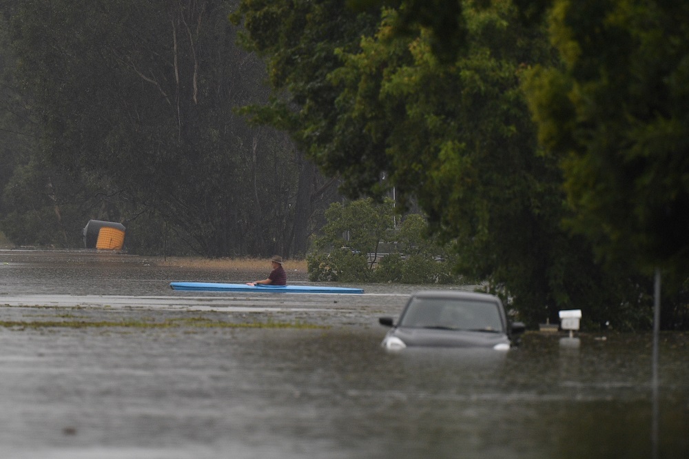 A view of the flooded Old Hawkesbury Road near Pitt Town and Windsor, New South Wales March 22, 2021. u00e2u20acu201d AAP Image/Dean Lewins/via Reuters