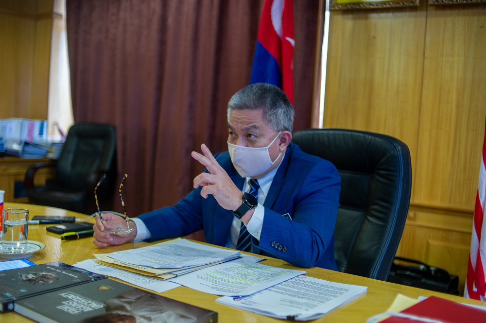 Health minister Datuk Seri Dr Adham Baba speaks to a reporter during an interview session with Malay Mail at the Ministry of Health in Putrajaya, March 4, 2021. u00e2u20acu201d Picture by Shafwan Zaidon 