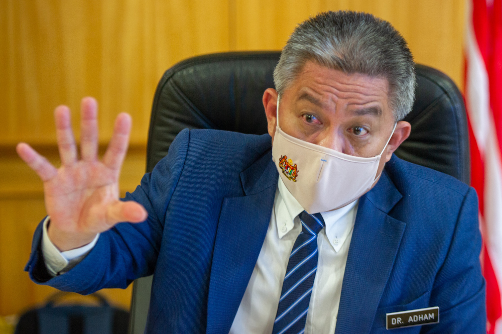 Health minister Datuk Seri Dr Adham Baba speaks to a reporter during an interview session with Malay Mail at the Ministry of Health in Putrajaya, March 4, 2021. u00e2u20acu201d Picture by Shafwan Zaidon 