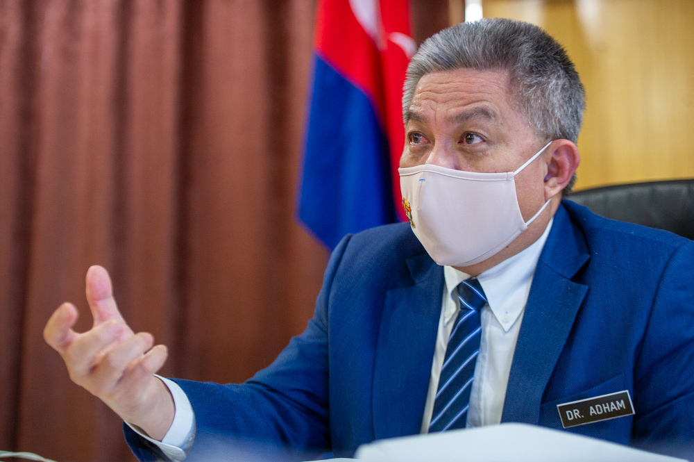 Health minister Datuk Seri Dr Adham Baba speaks to a reporter during an interview session with Malay Mail at the Ministry of Health in Putrajaya, March 4, 2021. u00e2u20acu201d Picture by Shafwan Zaidon 
